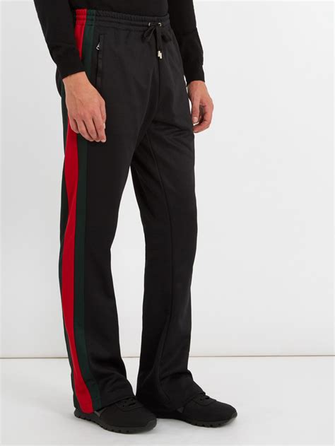 gucci stri ed pants|Gucci trousers for men.